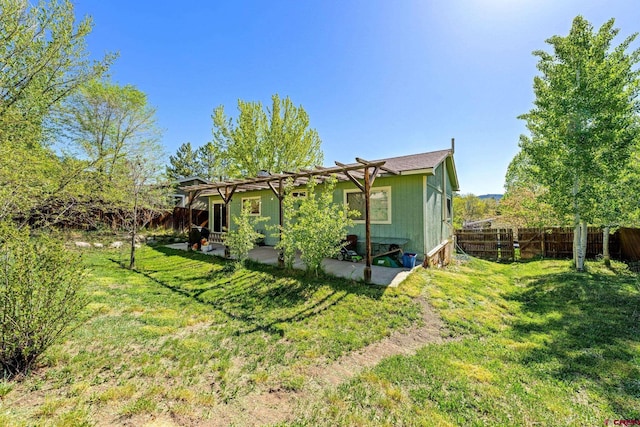 2503 Borrego Dr, Durango, CO 81301 - back of property with a patio and a pergola