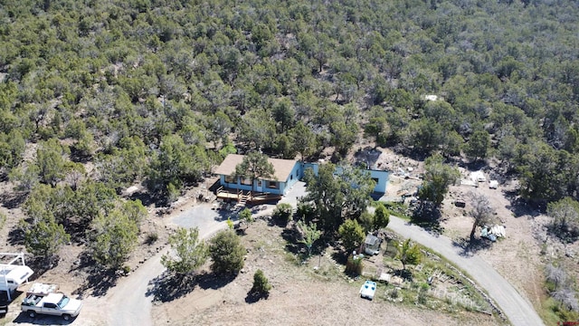 17992 Hanson Rd, Cedaredge, CO 81413 - aerial overview of property's location with a heavily wooded area