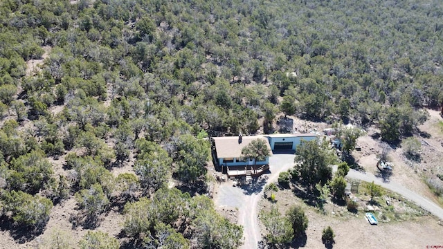17992 Hanson Rd, Cedaredge, CO 81413 - aerial view of property's location with a heavily wooded area
