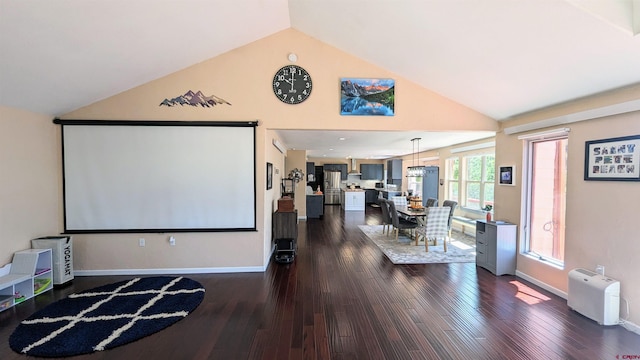 1625 Keepsake Loop, Westcliffe, CO 81252 - cinema featuring vaulted ceiling, dark wood-style flooring, and baseboards