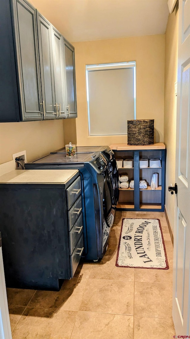 1625 Keepsake Loop, Westcliffe, CO 81252 - laundry area with cabinet space, independent washer and dryer, and light tile patterned floors