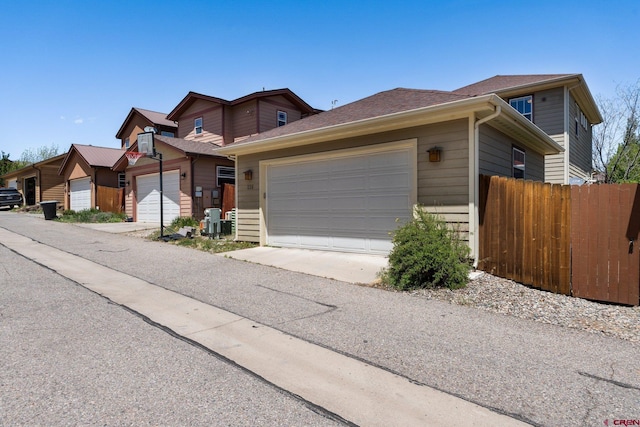 236 Sierra Vista St, Durango, CO 81301 - view of front facade with a garage and driveway