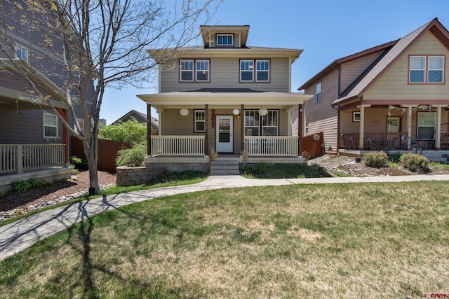 236 Sierra Vista St, Durango, CO 81301 - american foursquare style home featuring covered porch and a front lawn