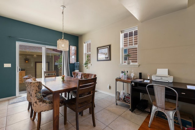 236 Sierra Vista St, Durango, CO 81301 - dining area featuring light tile patterned floors, baseboards, and a desk