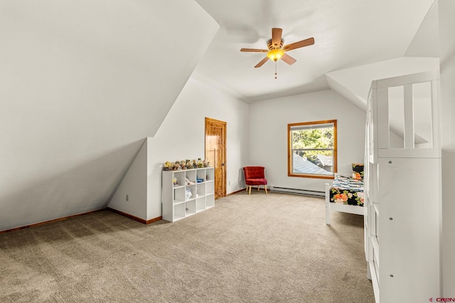 380 Eagle Pass, Durango, CO 81301 - recreation room featuring carpet floors, baseboard heating, baseboards, a ceiling fan, and vaulted ceiling