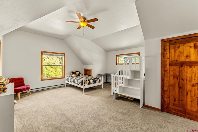 380 Eagle Pass, Durango, CO 81301 - carpeted bedroom featuring multiple windows, a baseboard radiator, lofted ceiling, and ceiling fan