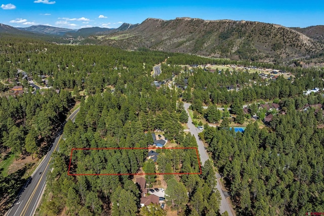 380 Eagle Pass, Durango, CO 81301 - view of property location with a heavily wooded area, a mountainous background, and property parcel outlined