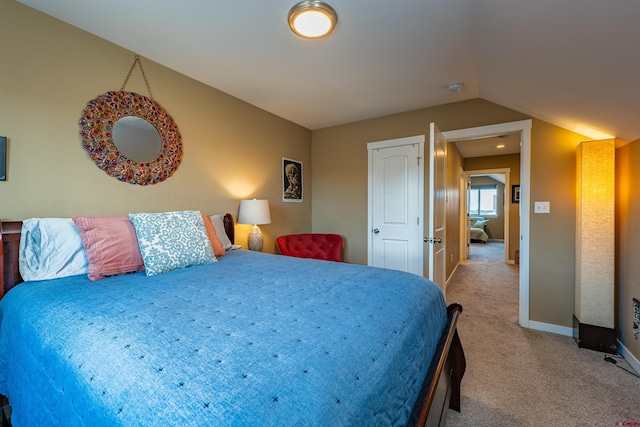 1607 S Taylor Cir, Bayfield, CO 81122 - bedroom featuring light colored carpet, lofted ceiling, and baseboards