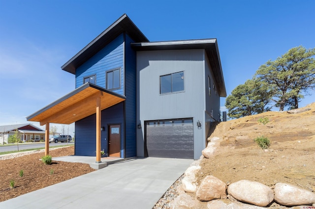 7 Yarrow Ct, Durango, CO 81301 - contemporary house featuring a garage and driveway