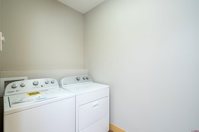 7 Yarrow Ct, Durango, CO 81301 - laundry area with washer and dryer and baseboards