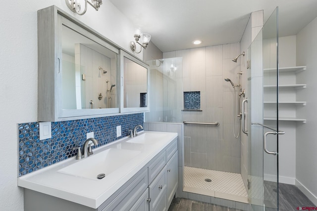 41 Ridge Pl, Durango, CO 81301 - full bathroom with a shower stall, double vanity, backsplash, and recessed lighting