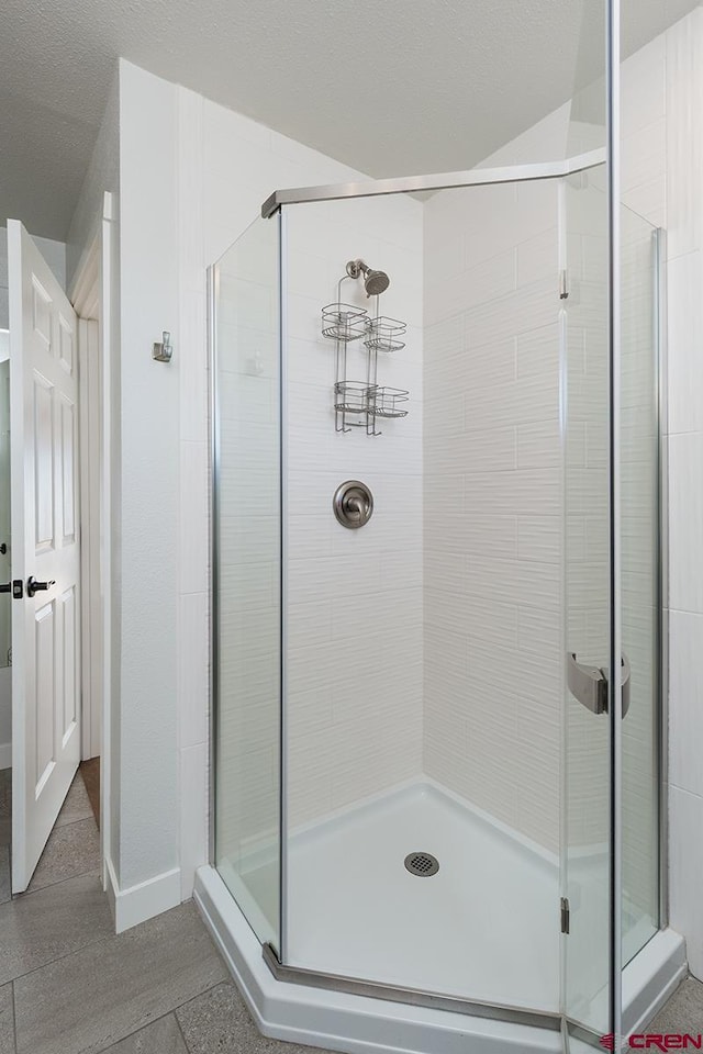 41 Ridge Pl, Durango, CO 81301 - full bathroom with a stall shower and baseboards