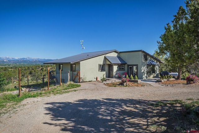 41 Ridge Pl, Durango, CO 81301 - view of front of house with stucco siding and a mountain view
