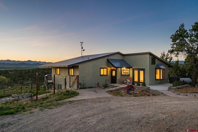 41 Ridge Pl, Durango, CO 81301 - mid-century home featuring metal roof and stucco siding