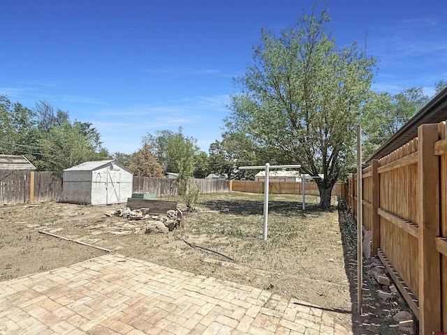 1246 Meeker St, Delta, CO 81416 - fenced backyard with a patio area
