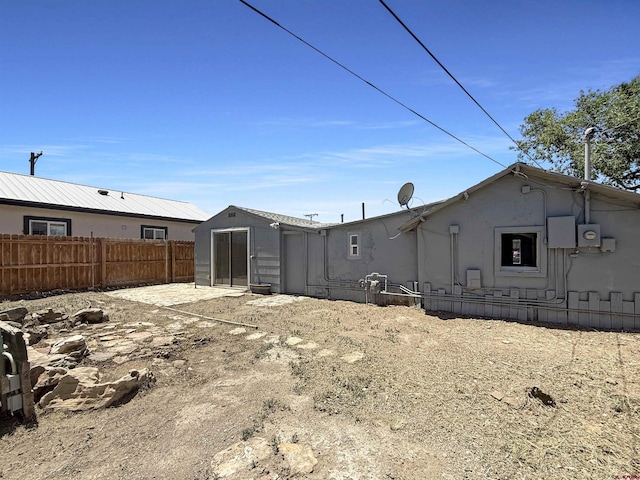 1246 Meeker St, Delta, CO 81416 - back of house featuring stucco siding