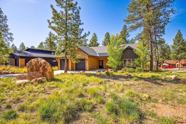 225 Hay Barn Rd, Durango, CO 81301 - view of front facade featuring an attached garage and driveway