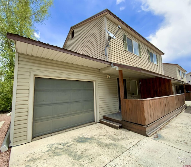 308 S 11th St Unit 1, Gunnison, CO 81230 - view of front of property featuring covered porch and driveway