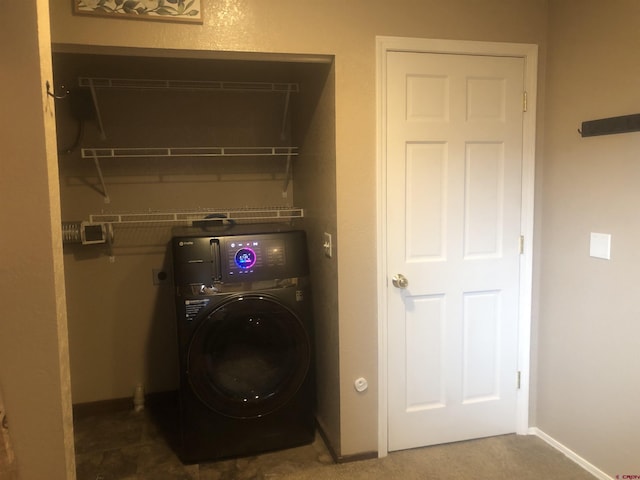 22 Lancer Ct, Pagosa Springs, CO 81147 - washroom featuring washer / clothes dryer and baseboards