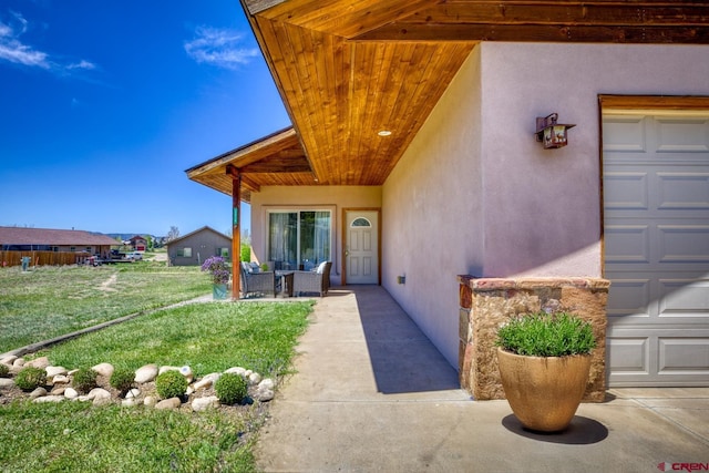 2038 Park Ave, Pagosa Springs, CO 81147 - property entrance featuring stucco siding and a yard