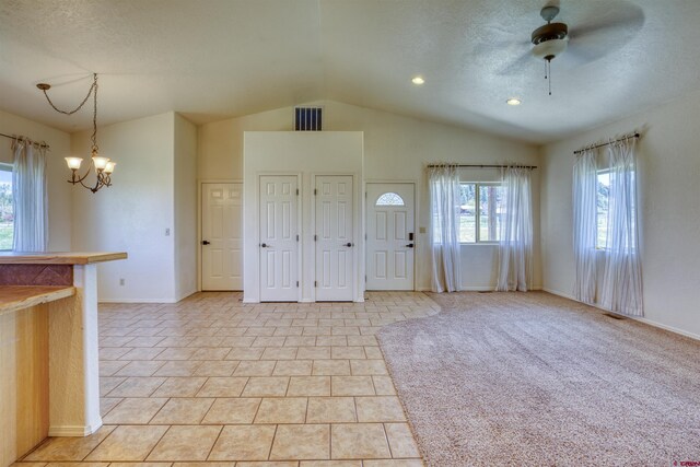 2038 Park Ave, Pagosa Springs, CO 81147 - entryway with a chandelier, vaulted ceiling, baseboards, and recessed lighting