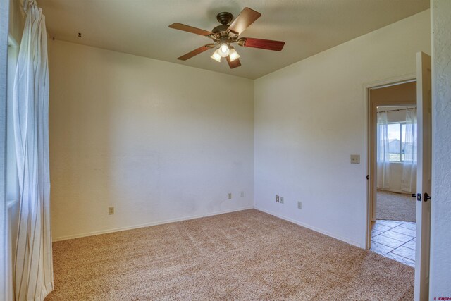 2038 Park Ave, Pagosa Springs, CO 81147 - carpeted empty room featuring a ceiling fan and baseboards