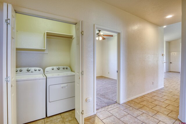 2038 Park Ave, Pagosa Springs, CO 81147 - laundry area featuring washer and dryer, ceiling fan, and light tile patterned flooring