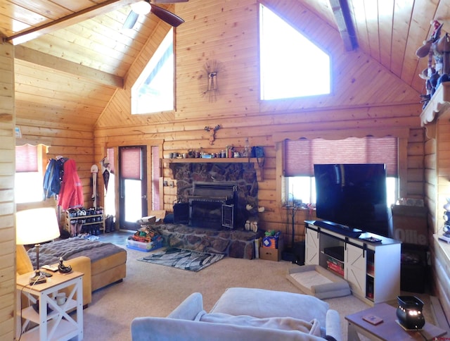 11787 Castle Rock Rd, Del Norte, CO 81132 - carpeted living room featuring high vaulted ceiling, plenty of natural light, wood ceiling, a ceiling fan, and wooden walls