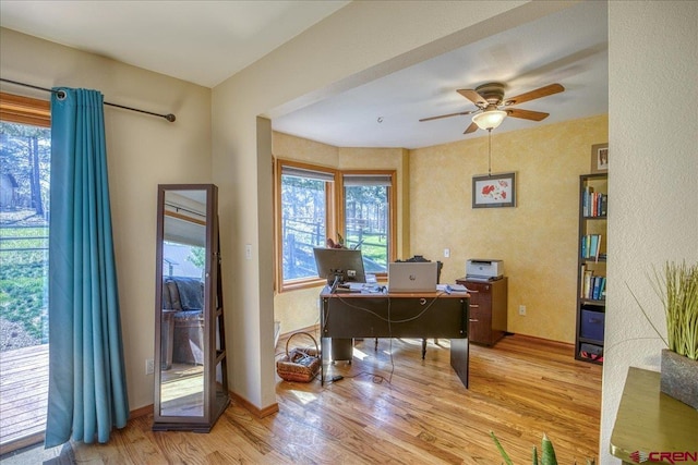 165 Twin Creek Cir, Pagosa Springs, CO 81147 - office area featuring light wood-style floors, a ceiling fan, and baseboards