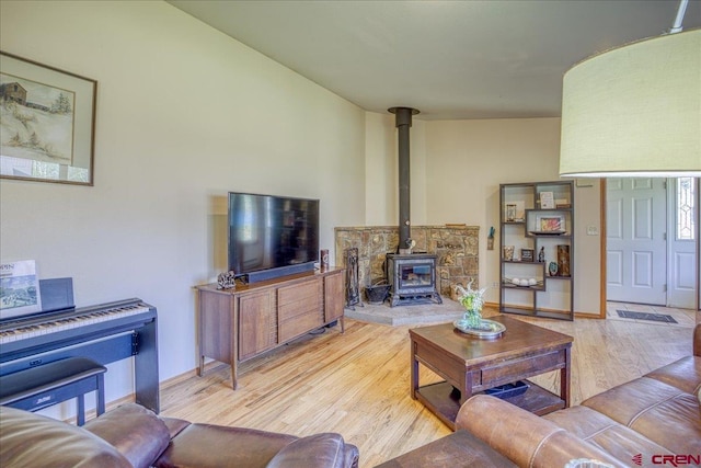 165 Twin Creek Cir, Pagosa Springs, CO 81147 - living area with a wood stove and wood finished floors
