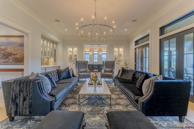 905 County Road 317, Crested Butte, CO 81224 - living room with french doors, a chandelier, crown molding, wood finished floors, and recessed lighting