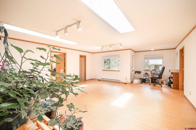 37 Verde Ln, Durango, CO 81301 - interior space featuring a baseboard heating unit and an office area