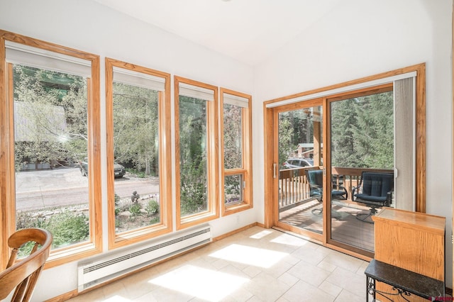 37 Verde Ln, Durango, CO 81301 - sunroom / solarium with baseboard heating, plenty of natural light, vaulted ceiling, and baseboards