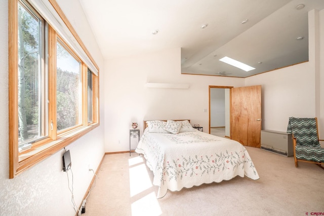 37 Verde Ln, Durango, CO 81301 - bedroom featuring lofted ceiling, light colored carpet, and a skylight