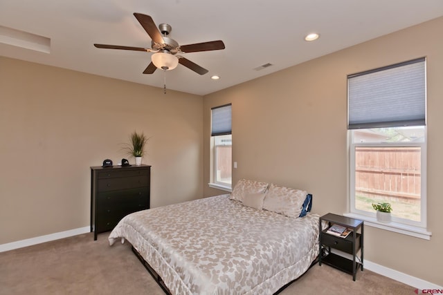 2488 Josefine Ln, Grand Junction, CO 81505 - bedroom with light carpet, baseboards, recessed lighting, and a ceiling fan