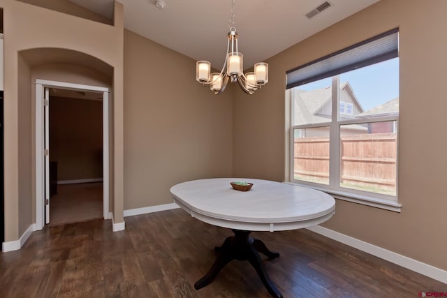2488 Josefine Ln, Grand Junction, CO 81505 - dining space featuring a chandelier, baseboards, and dark wood-style flooring