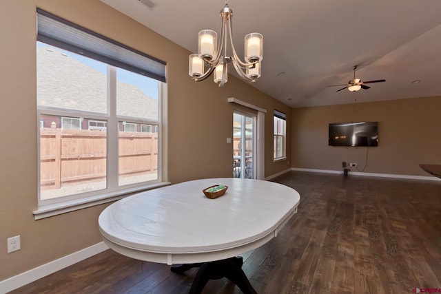 2488 Josefine Ln, Grand Junction, CO 81505 - dining room featuring dark wood finished floors, baseboards, a chandelier, a ceiling fan, and vaulted ceiling