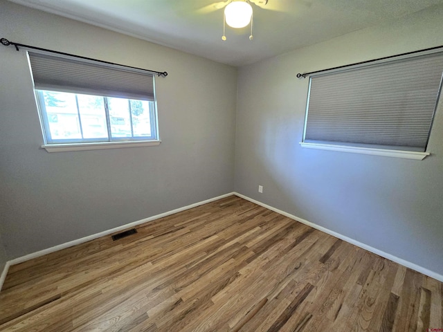 608 Alameda Dr, Cortez, CO 81321 - spare room featuring wood finished floors, baseboards, and ceiling fan