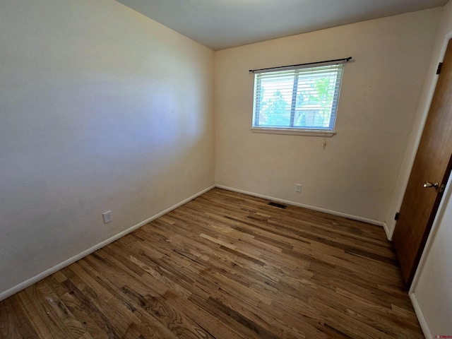 608 Alameda Dr, Cortez, CO 81321 - spare room with baseboards and wood finished floors