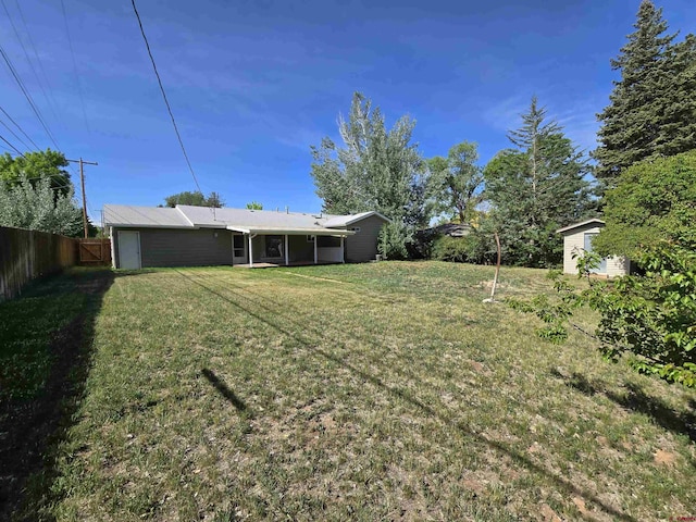608 Alameda Dr, Cortez, CO 81321 - view of yard with an outbuilding