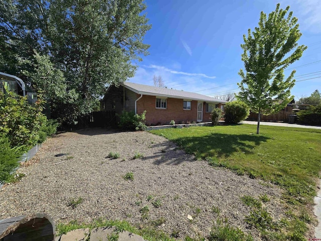 608 Alameda Dr, Cortez, CO 81321 - view of front of property featuring brick siding