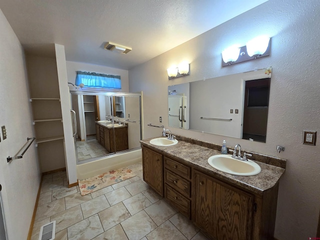 608 Alameda Dr, Cortez, CO 81321 - full bath featuring double vanity and a shower with shower door