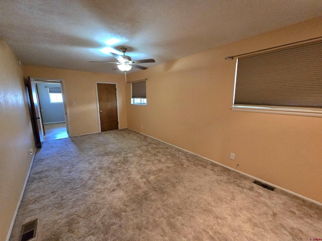 608 Alameda Dr, Cortez, CO 81321 - carpeted spare room featuring a ceiling fan and baseboards