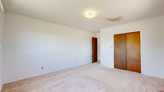 21187 Cherry Ln, Eckert, CO 81418 - unfurnished bedroom featuring carpet and a closet