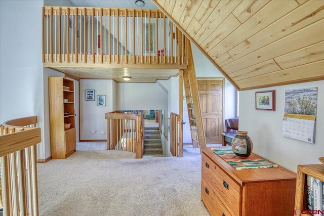 88 W Peregrine Cir Unit 4Unit 1, Pagosa Springs, CO 81147 - stairs featuring carpet, vaulted ceiling, wooden ceiling, and baseboards