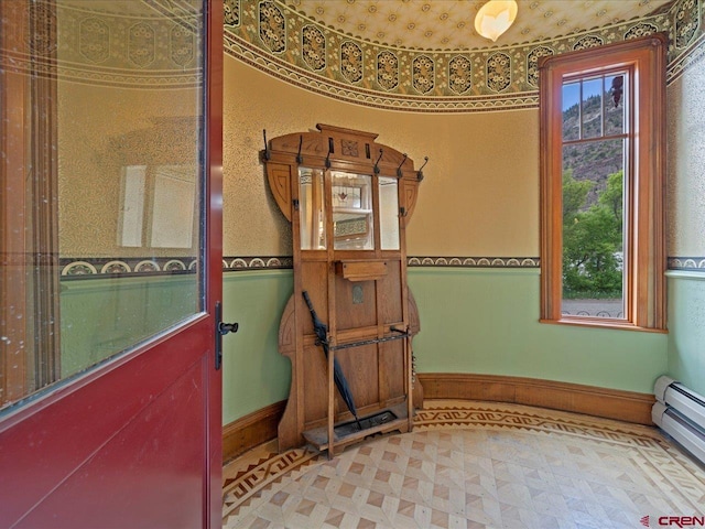 445 4th St, Ouray, CO 81427 - detailed view of a baseboard radiator and baseboards