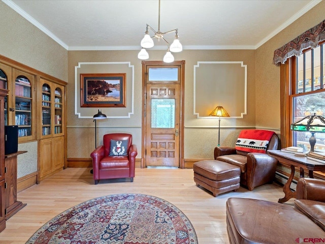 445 4th St, Ouray, CO 81427 - living area with wood finished floors, healthy amount of natural light, ornamental molding, and baseboards