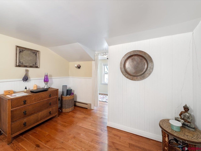 445 4th St, Ouray, CO 81427 - interior space featuring a baseboard radiator, wood finished floors, and wainscoting