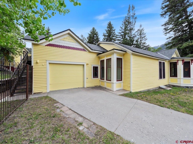 445 4th St, Ouray, CO 81427 - view of front of home with a garage and driveway
