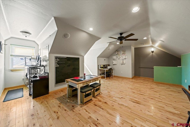 2224 American Way, Montrose, CO 81401 - additional living space featuring lofted ceiling, light wood-style flooring, baseboards, ceiling fan, and a textured ceiling